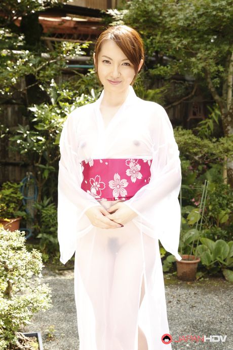 Excellent Asian babe Hitomi Hayama shows her hot butt and her trimmed pussy