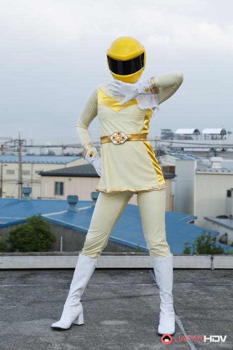 Alluring Asian babe in boots and gloves strips and highlights her body