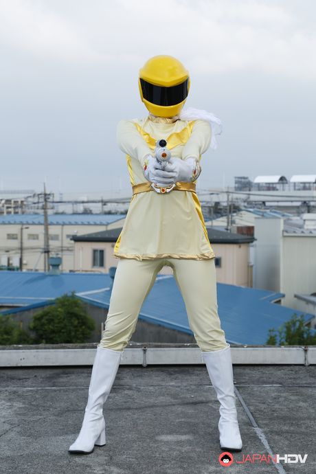 Alluring Asian babe in boots and gloves strips and highlights her body