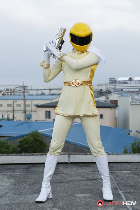 Alluring Asian babe in boots and gloves strips and highlights her body