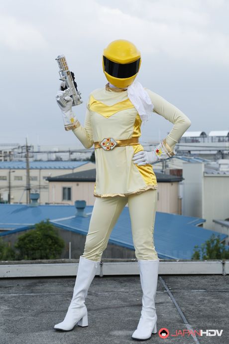 Alluring Asian babe in boots and gloves strips and highlights her body