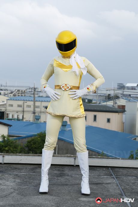 Alluring Asian babe in boots and gloves strips and highlights her body