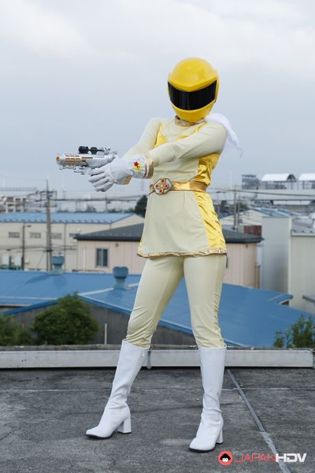 Alluring Asian babe in boots and gloves strips and highlights her body