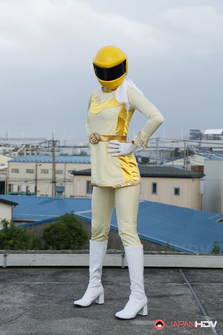 Alluring Asian babe in boots and gloves strips and highlights her body