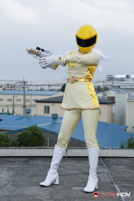 Alluring Asian babe in boots and gloves strips and highlights her body