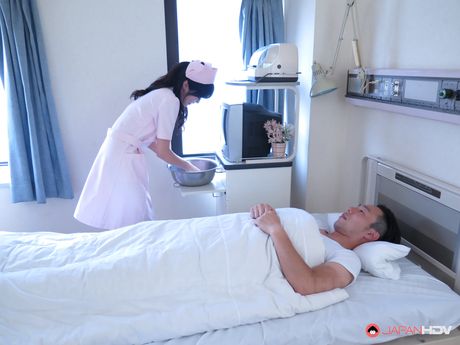 J: Asian nurse Sara Yurikawa strips and shows her tits and ass in a solo