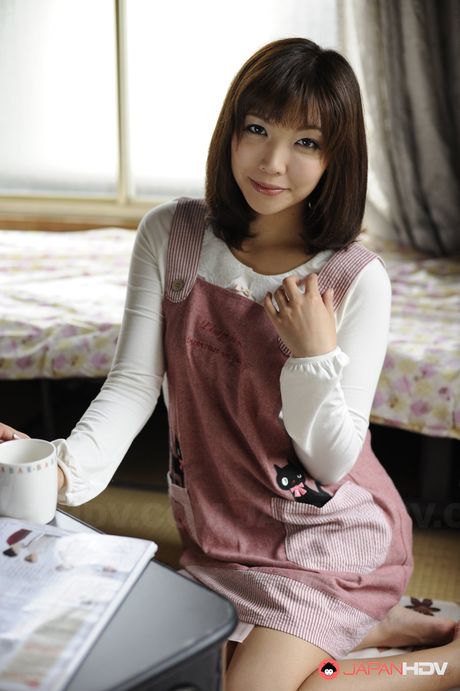 First-class Asian teen Juri Kitahara strips and toys her pussy in a solo