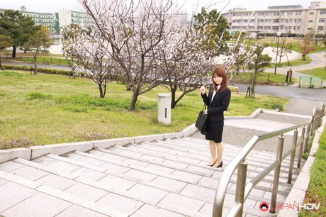 Asian assistant Kimoko Tsuji highlights her perfect butt and toys her hairy pussy