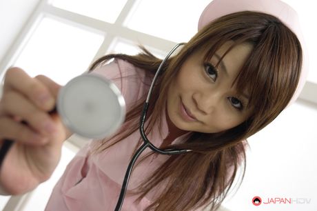 Asian nurse Honami Isshiki gets a mouthful of cum after giving blowjob