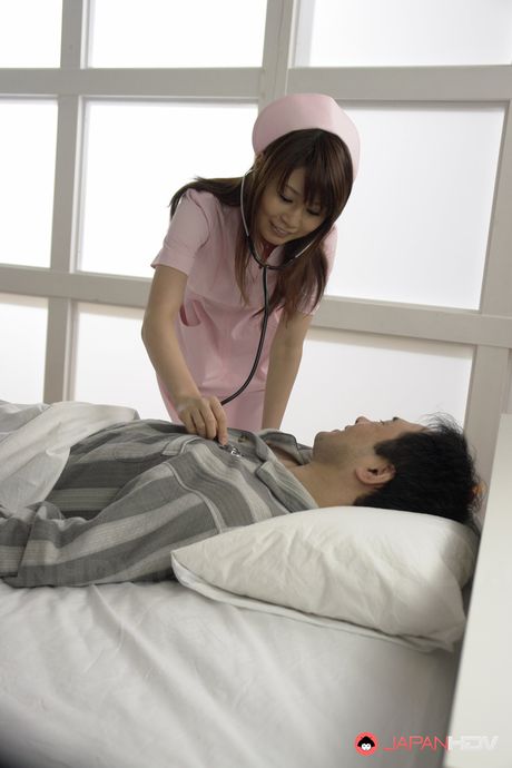Asian nurse Honami Isshiki gets a mouthful of cum after giving blowjob