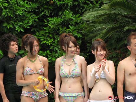 Perfect Asian girls get their pussies fingered and fucked in a poolside orgy