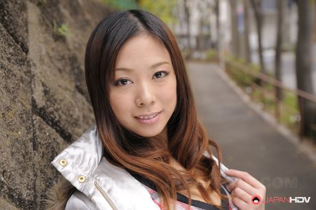 Asian beauty Asuka presents her large boobs and toys her pussy outdoors