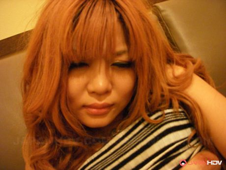 Pretty japanese redhead Sarina Tsubaki gets her pussy drilled in a cafe