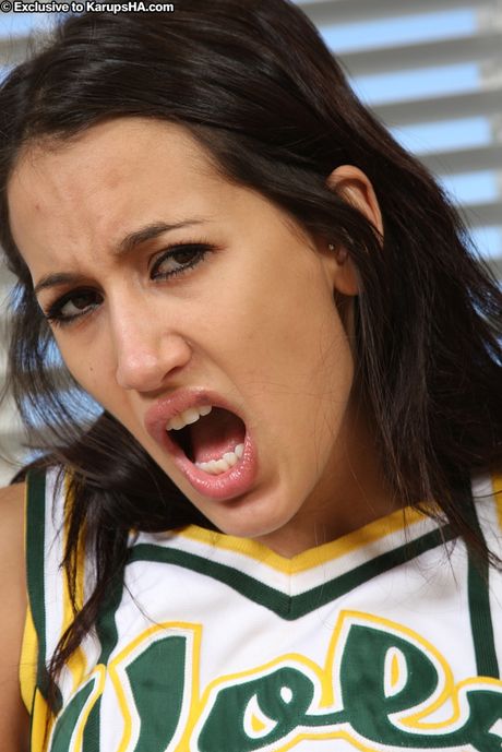 Dark-haired cheerleader Amia Moretti gets her pussy stuffed with a dick