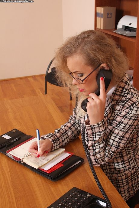 Appealing blond milf Collette in hot underwear exposing big boobs and spreading her legs in office