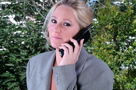 Blonde american covergirl Alexis Malone removes her glasses before showing her pussy