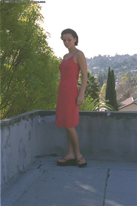 Striking hungarian amateur Cameron Cruz strips and displays her tits and pussy outdoors