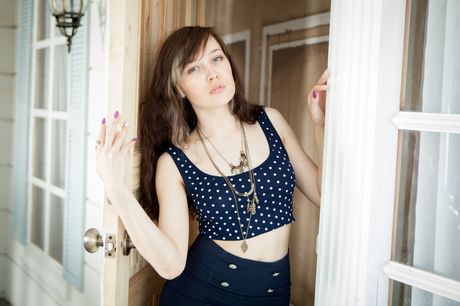 Skinny russian girl Ulia removes her clothes and shows her hairy pussy