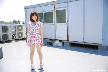 Brown-eyed Japanese babe Tomoka Sakurai reveals her large boobs and masturbates