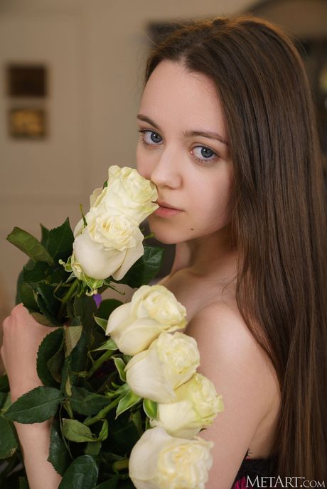 Tender teen Angel Petite removes her lingerie to pose nude boldly