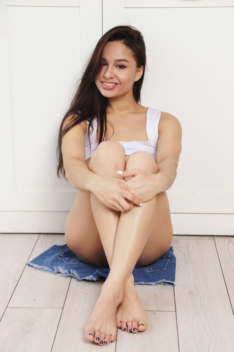 Winsome teen Astrid Herrara bares herself in the kitchen