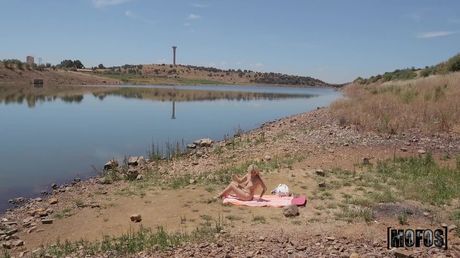 Blonde ukrainian girl Lisi Kitty gets banged on a blanket by the sea