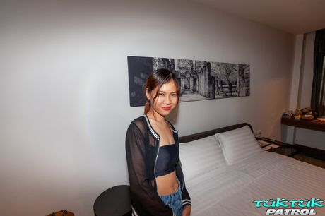 Asian covergirl Blue works free of her clothes before a finger fuck