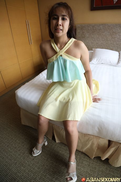 Adult Asian lady Gif B takes a cumshot on her pussy after a fuck