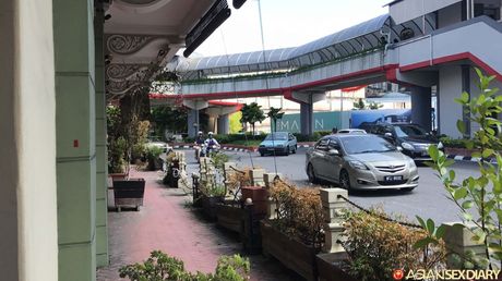 Tat-Covered babe Angely demonstrates her amazing juggs and spreads her hairy pussy