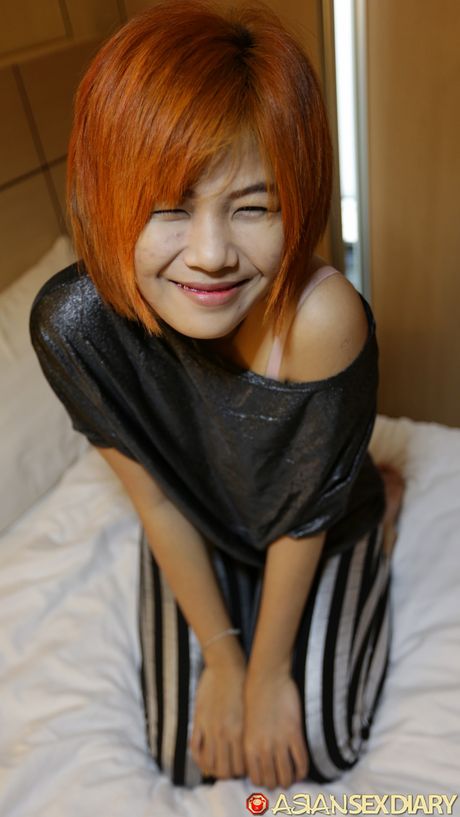 Fantastic Asian MILF Pa flaunts her petite tits and offers her figure without clothing in a solo