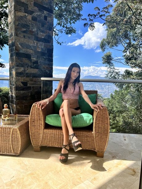 Hot colombian girl Megan Petite highlights her massive booty and rubs her pussy outdoors