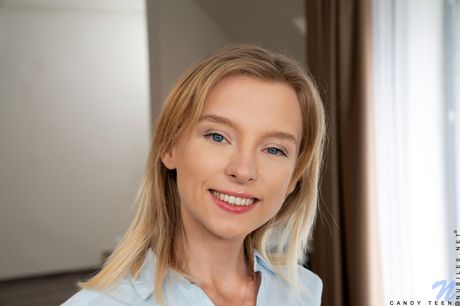 Skinny blonde Candy Teen strips off her panties before fingering her pussy