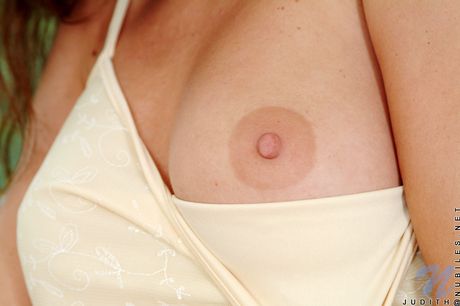 Stunning hungarian girl Judith Fox demonstrates her amazing boobs and captures her skyclad appearance in a solo