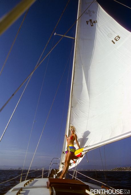 Blonde babe Pipi Anderssen highlights her big tits and ass outdoors