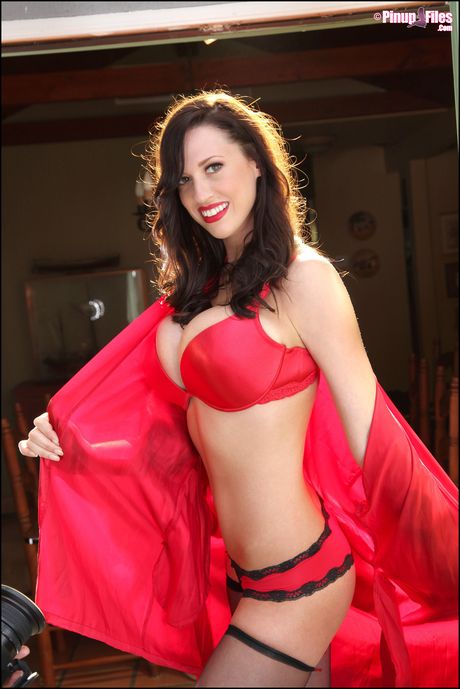 Big-Racked german brunette Lana Kendrick strips to her heels and disrobes for the modeling session