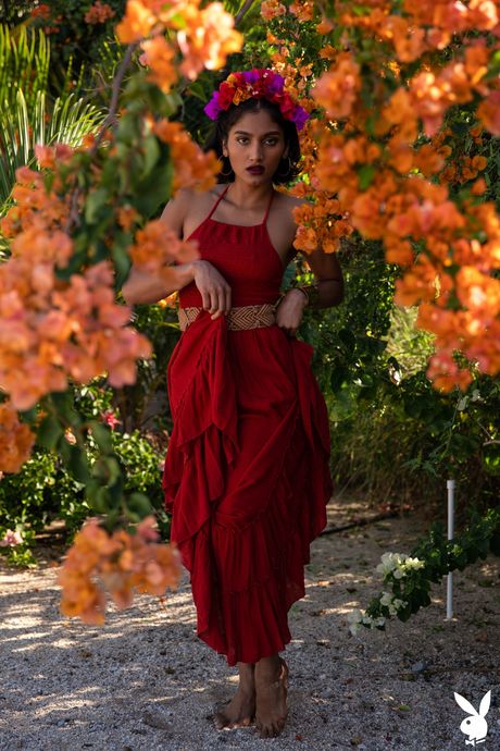 Great indian brunette Angel Constance gets naked in a red dress