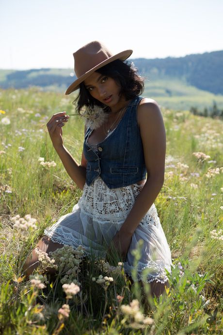 Brunette indian model Angel Constance reveals her nice tits and poses outdoors