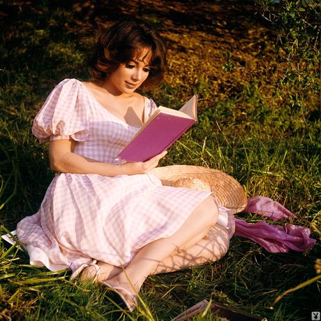 Hot stunner Merissa Mathes gets naked on a swing in a backyard