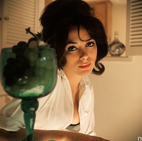 Hot stunner Merissa Mathes gets naked on a swing in a backyard