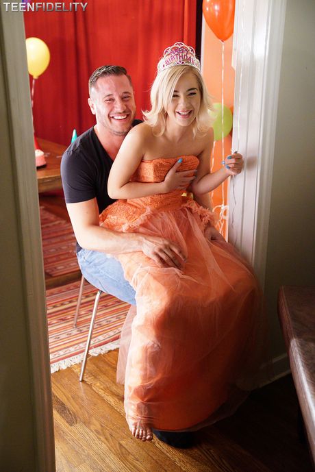 Blonde american girl Bella Rose seduces her man friend in a red dress