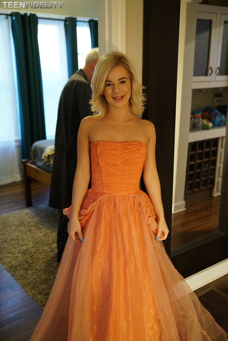 Blonde american girl Bella Rose seduces her man friend in a red dress