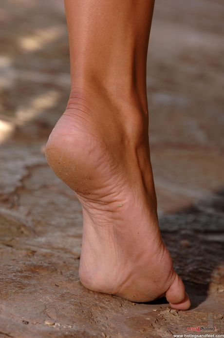 Sexy Hungarian babe Aletta Ocean strips and fingers her twat outdoors