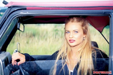 P: Hot hungarian blonde Nikki Anderson presents her big racks and exposes her body on a car