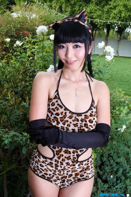 Asian doll Marica Hase demonstrates her big melons and poses in a leopard print