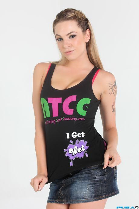 Inked american blonde Dahlia Sky presents her tits and ass in a solo show