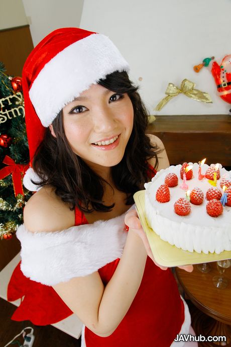 Asian cutie Saori flaunts her small tits and poses in a Christmas hat