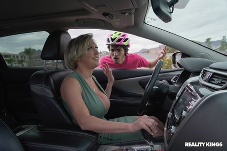 Aged american blonde Dee Williams has sex with a young man in her driveway