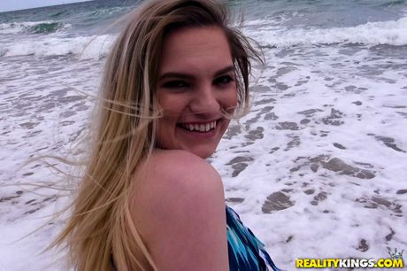 Blonde american covergirl Crystal Young gets banged on a blanket on a beach
