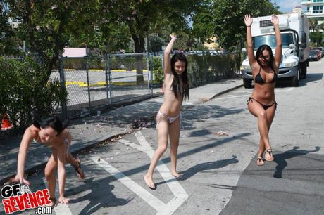 Three stunner girls take off their bikinis in a sexy manner