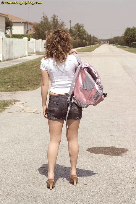 Naughty schoolgirl Amateur strips and presents her big ass outdoors